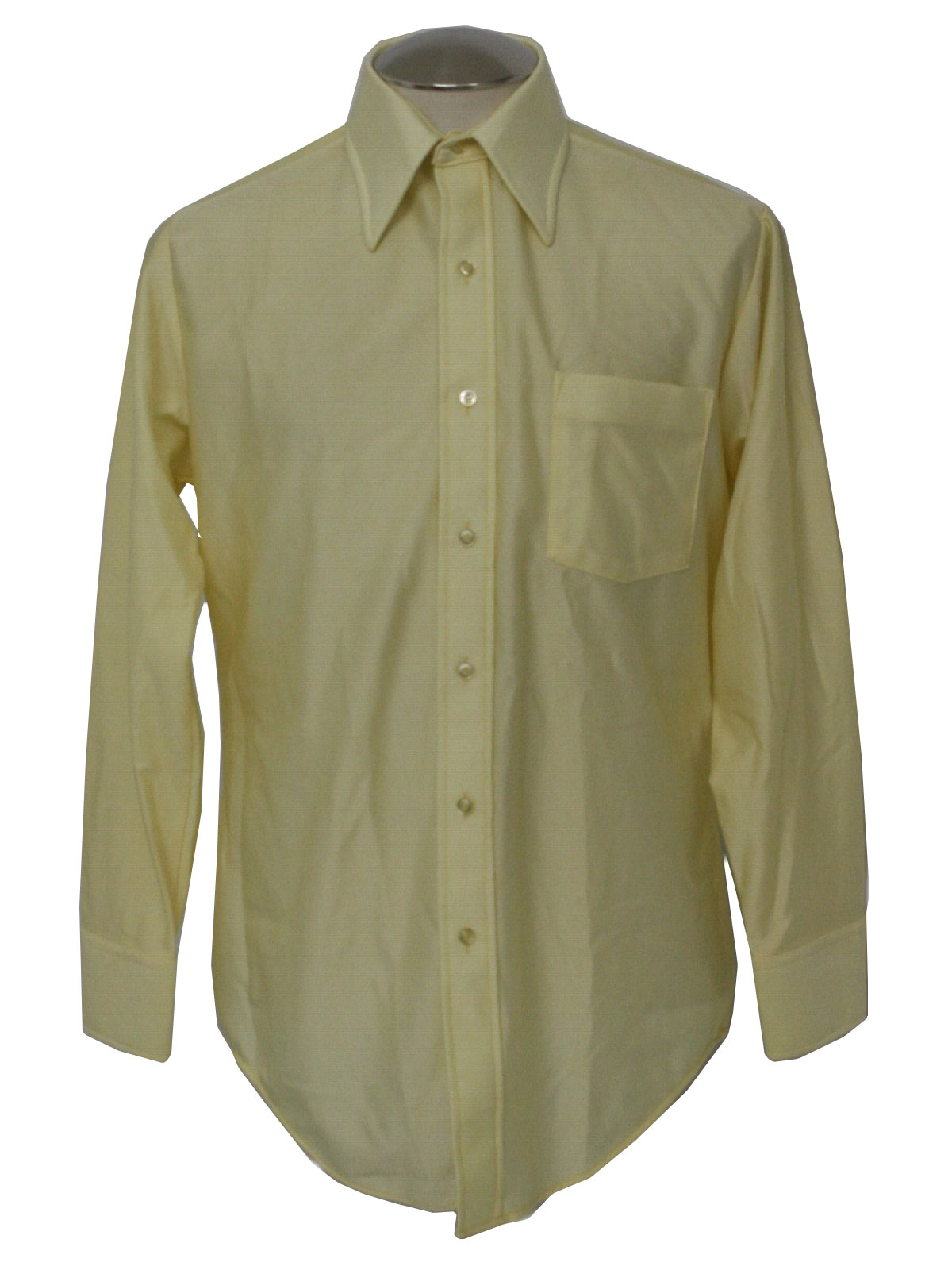 70s -Caldor- Mens pale yellow nylon disco shirt with wide pointed collar, button frony, single chest pocket, shirttail hem, and buttoning cuffs.