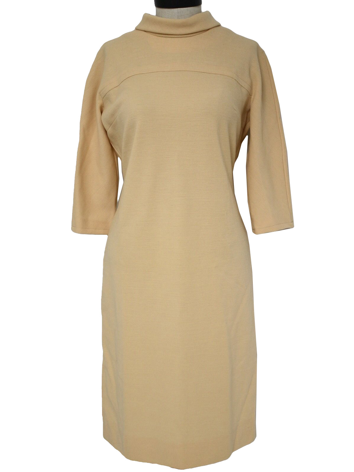 70s -Leslie Fay- Womens pale peach wool knit three quarter sleeve mid length dress. Yoked front, bust darts, a mock collar and back zip closure.