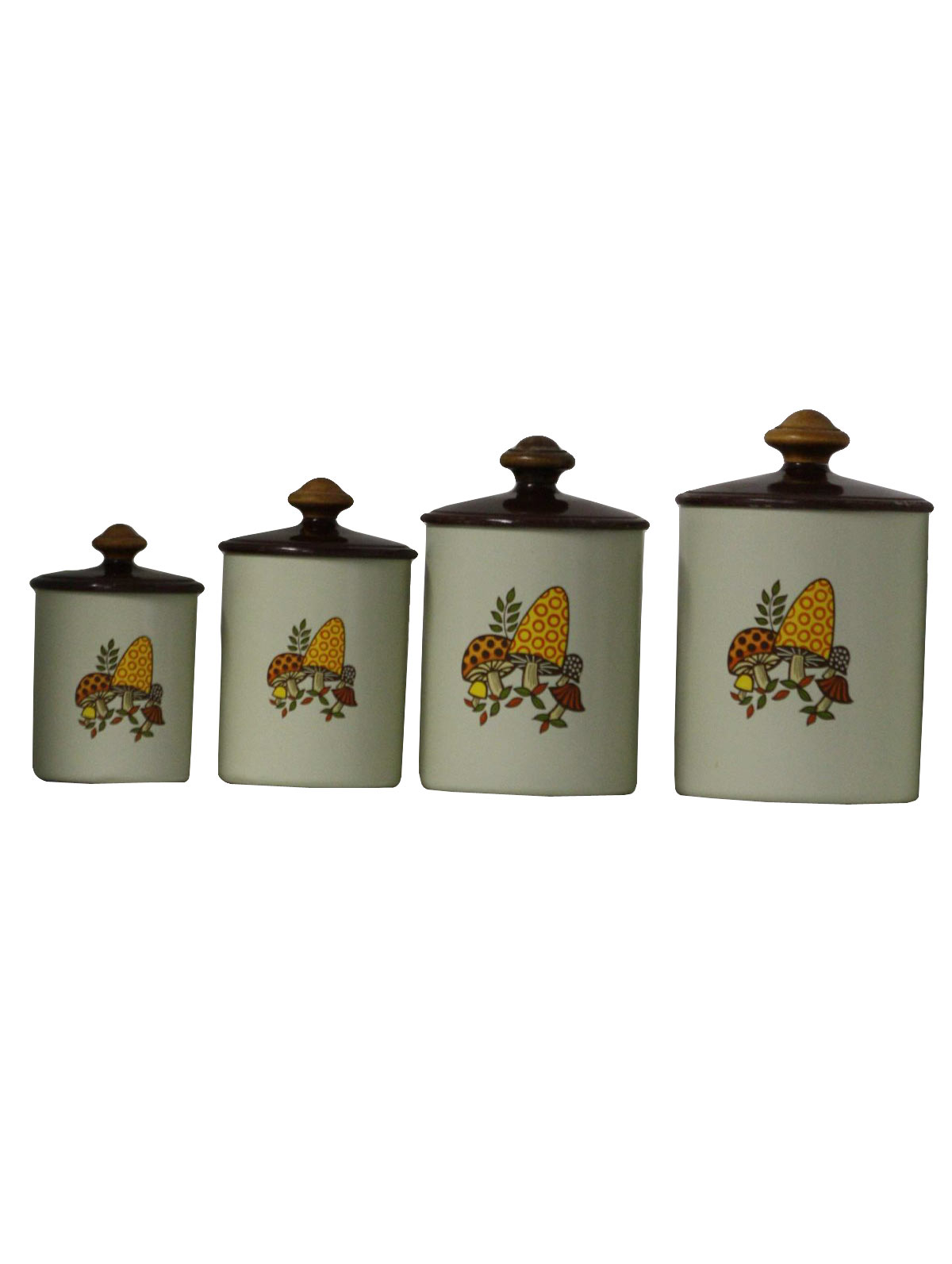 70s -West Bend- This set of four nesting mushroom themed tin canisters are sure to meet all your dry good storage needs with style in mind.