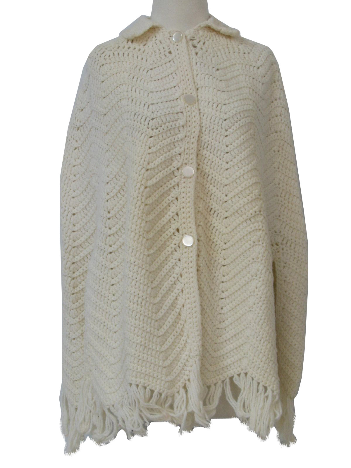 Retro Seventies Sweater: 70s -no label- Womens ivory acrylic crocheted poncho...