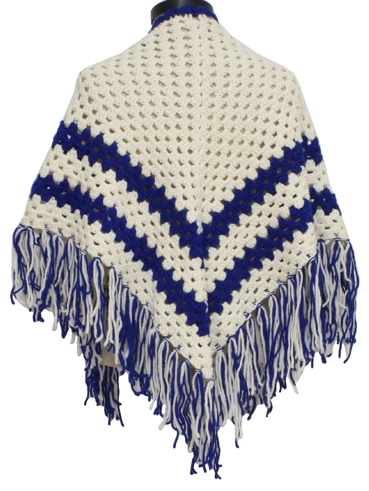 70s -no label- Womens ivory and cobalt blue acrylic crocheted shawl in a shell pattern with contrasting stripes and edging, and fringed hem.
