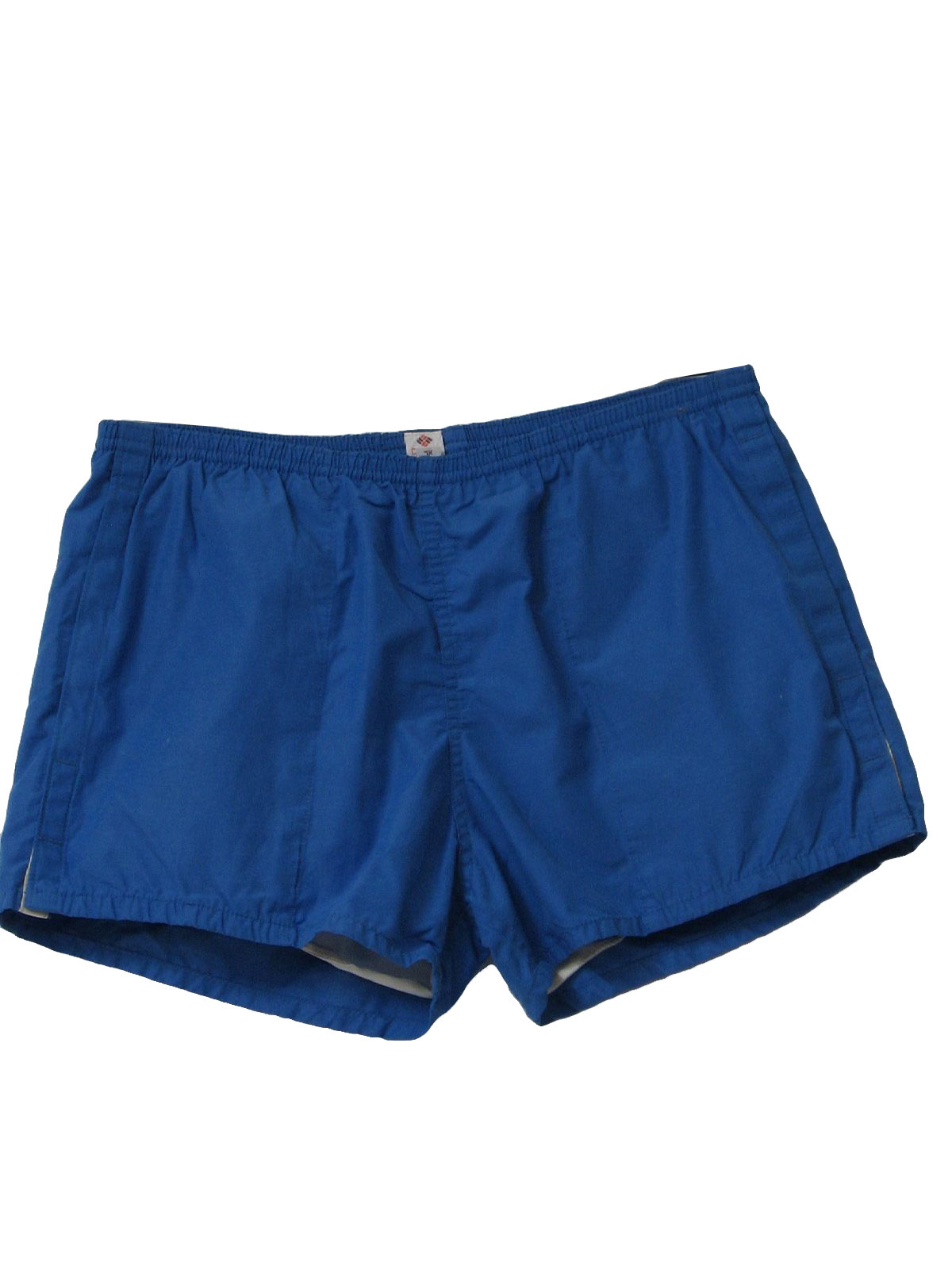 80s -Columbia- Mens blue polyester and cotton, nylon brief lined totally 80s swim trunks with elastic/tie off waistline and three pocket styling.