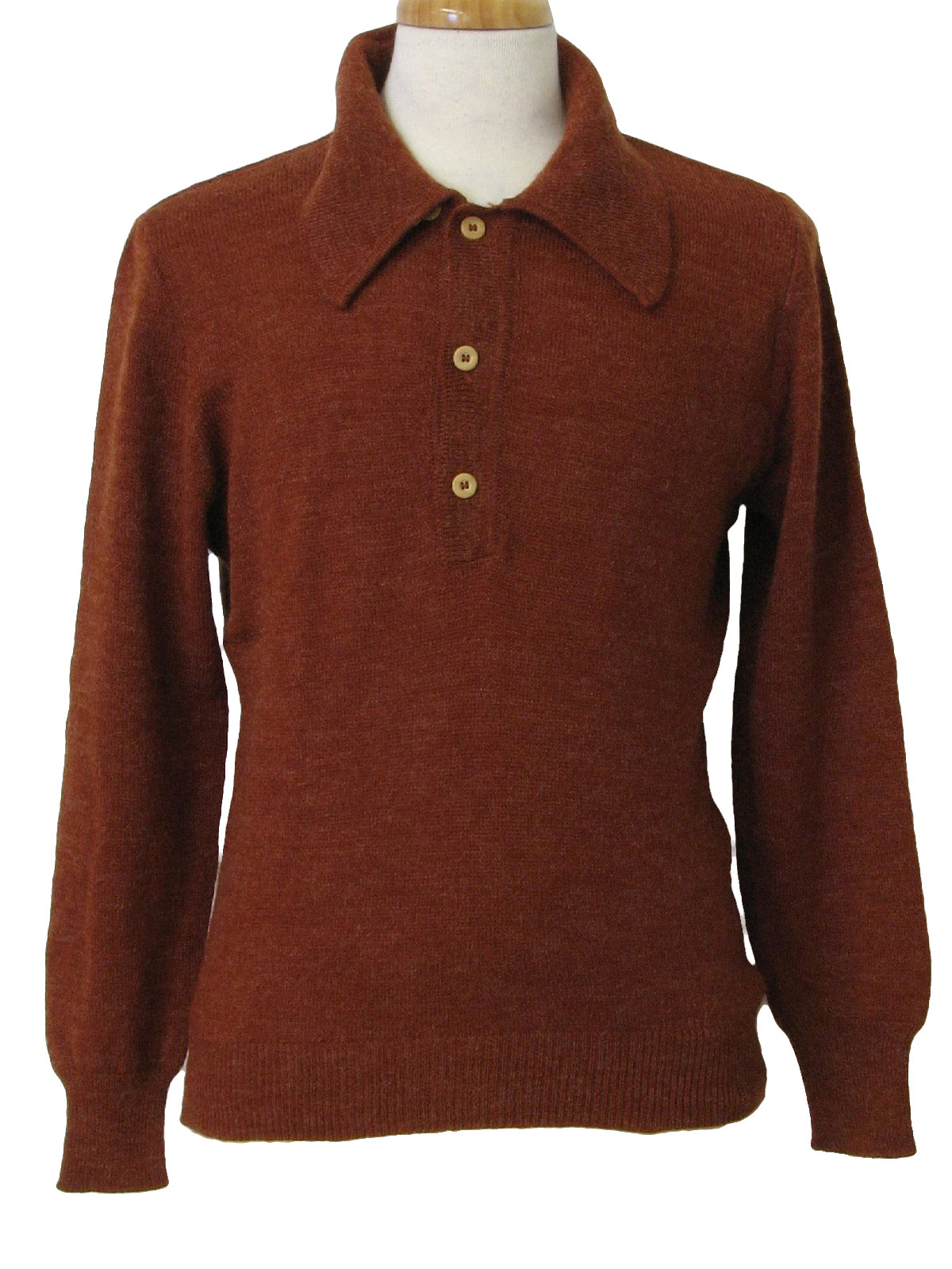 70s -no label- Mens rust wool blend long sleeve pullover mod knit shirt. Banded hem and cuffs, a fold over collar and three button placket.