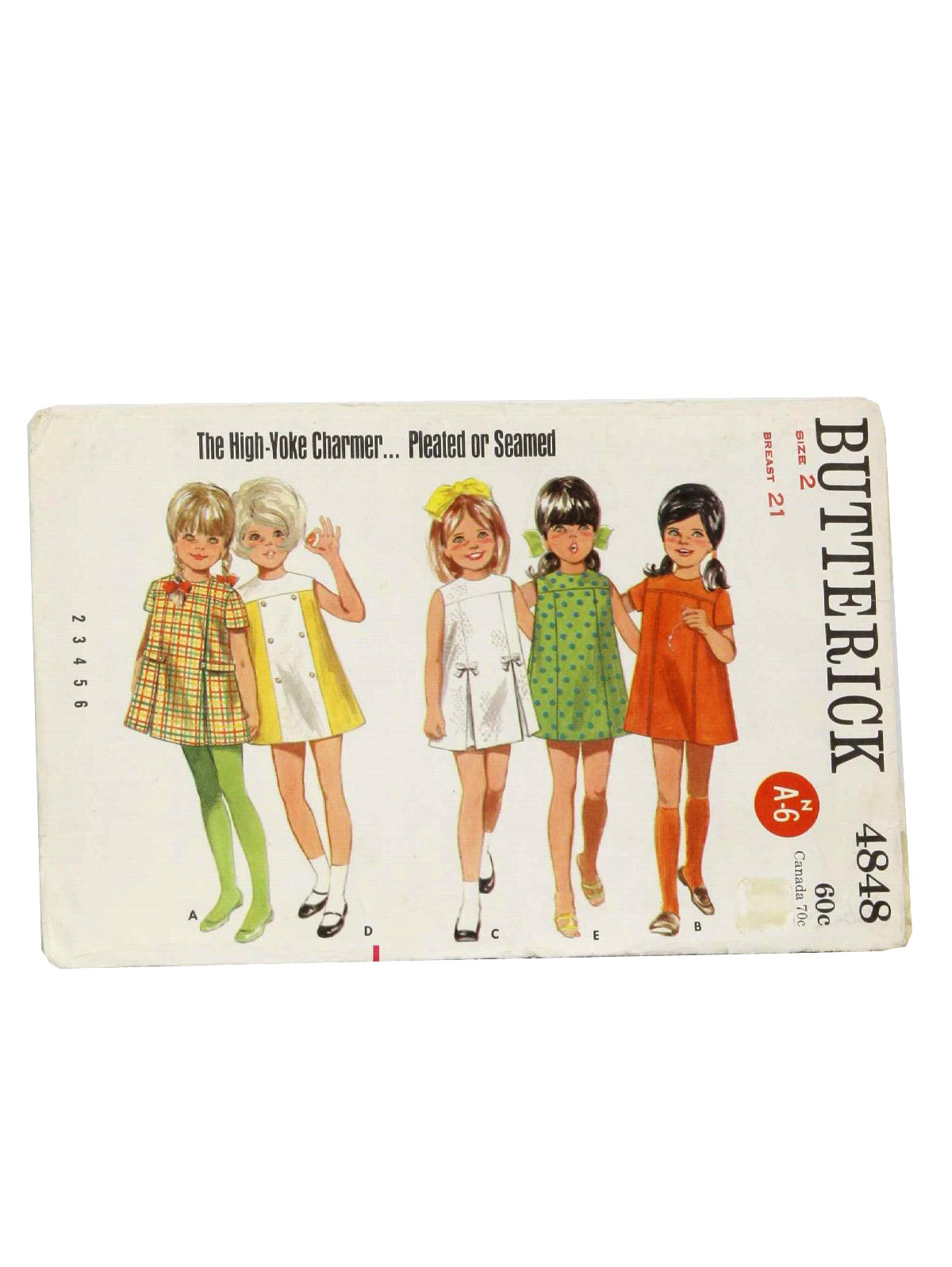 60s -Butterick No. 4848- Girls toddler size dress with a yoke detail and optional sleeves and pleats in front.