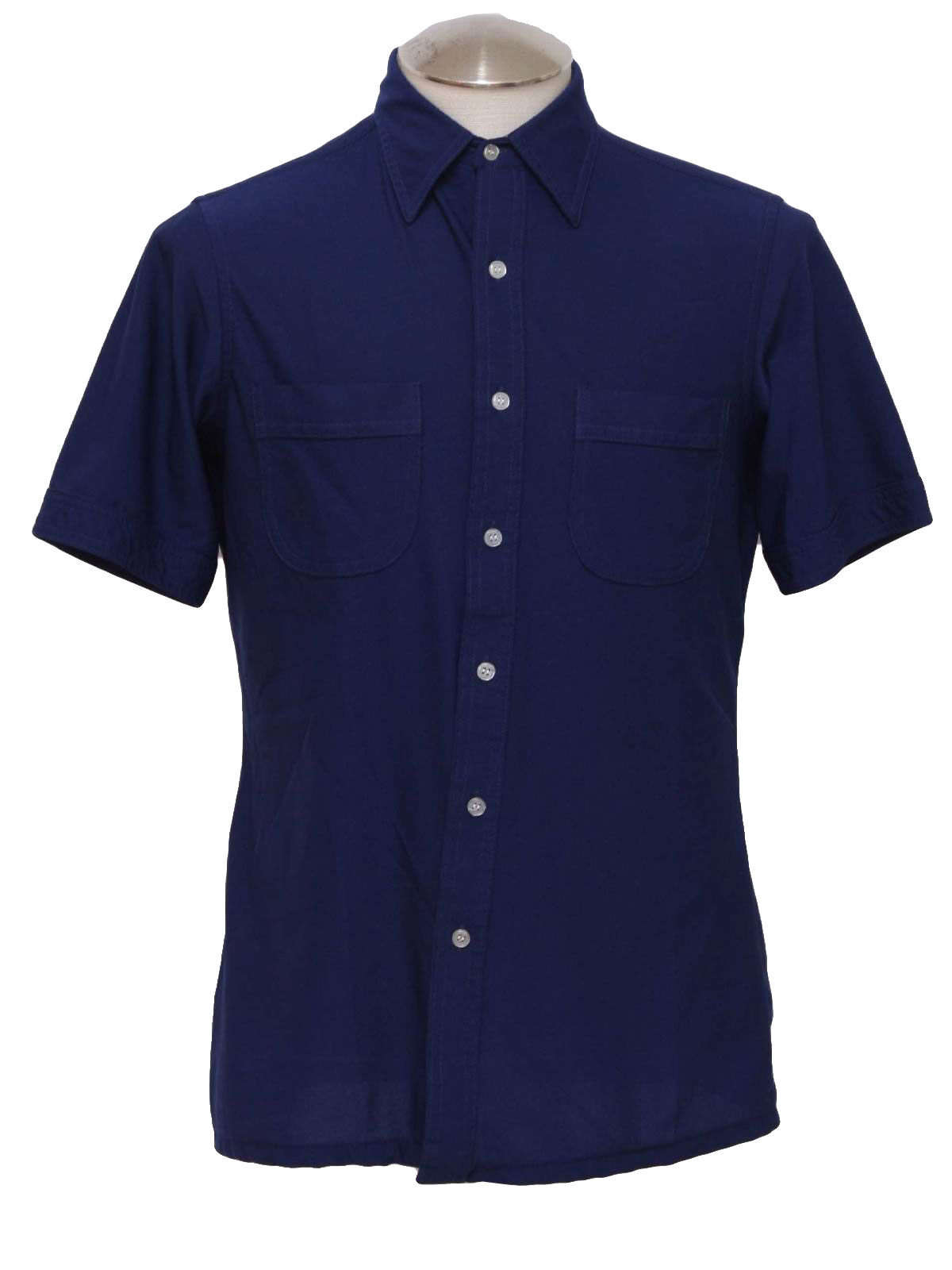 70s -JC Penny- Mens navy blue, shortsleeve, button front polyester sport shirt with fold over collar, two front patch pockets and straight bottom hem.
