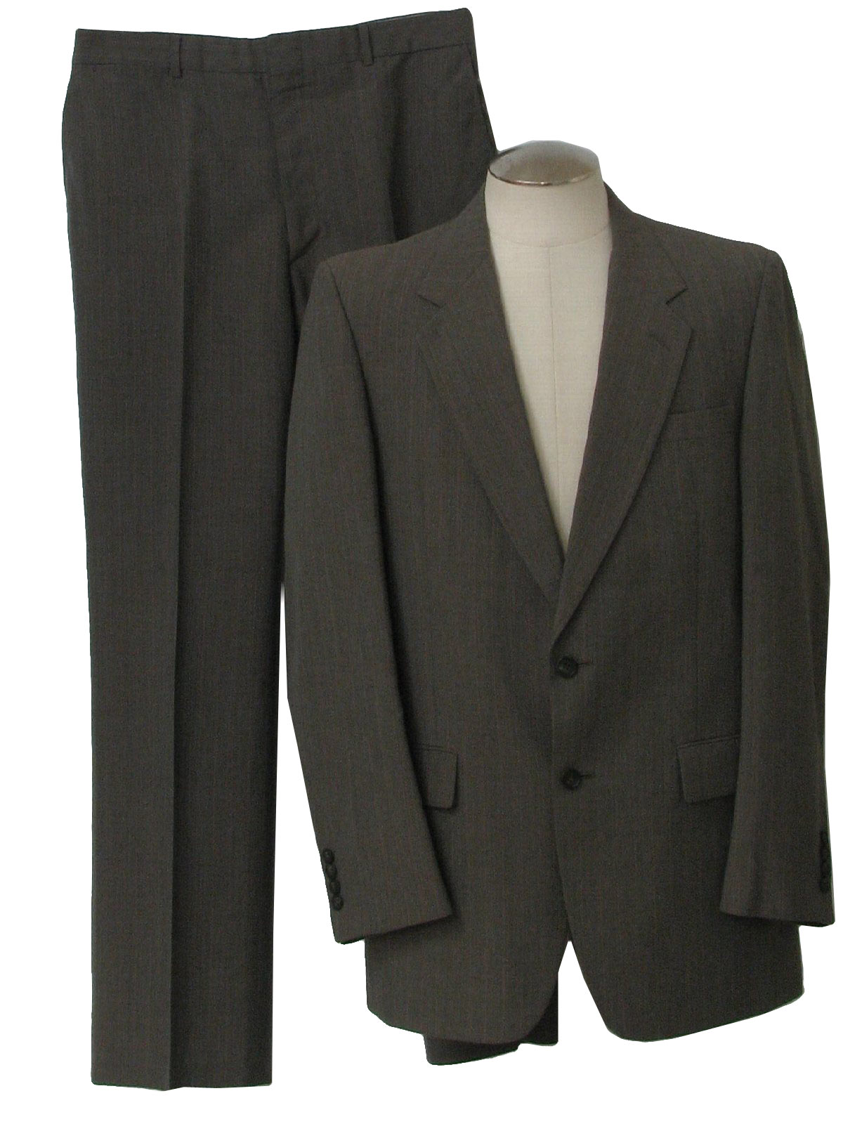 Oscar De La Renta Eighties Vintage Suit 80s Oscar De La Renta Mens grey blended polyester summer weight suit having micro pinstripes using mauve green and cream. The loose leg slack have