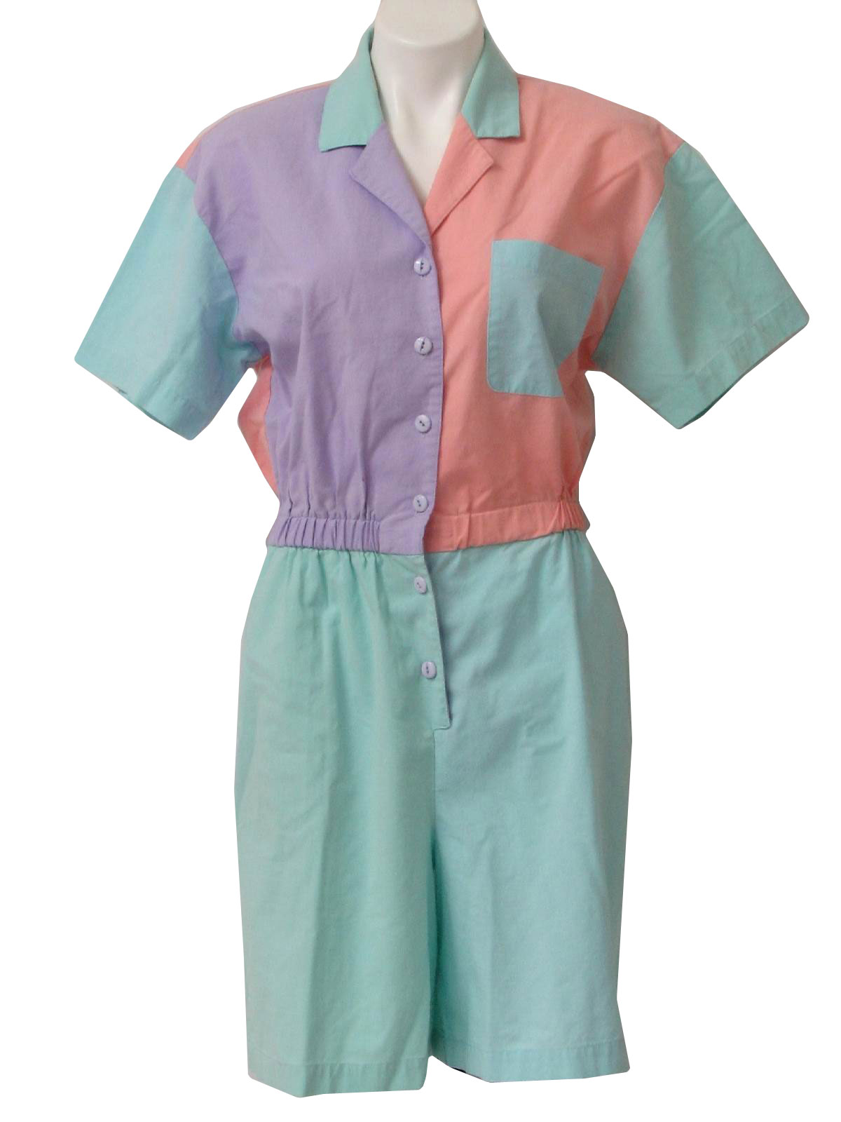 1980 s Retro Shorts Early 80s Catalina Womens aqua lavender and peach cotton blend short sleeve shorts jumpsuit. Color blocked with a left chest pocket elastic waist inset side pockets wide leg shor...