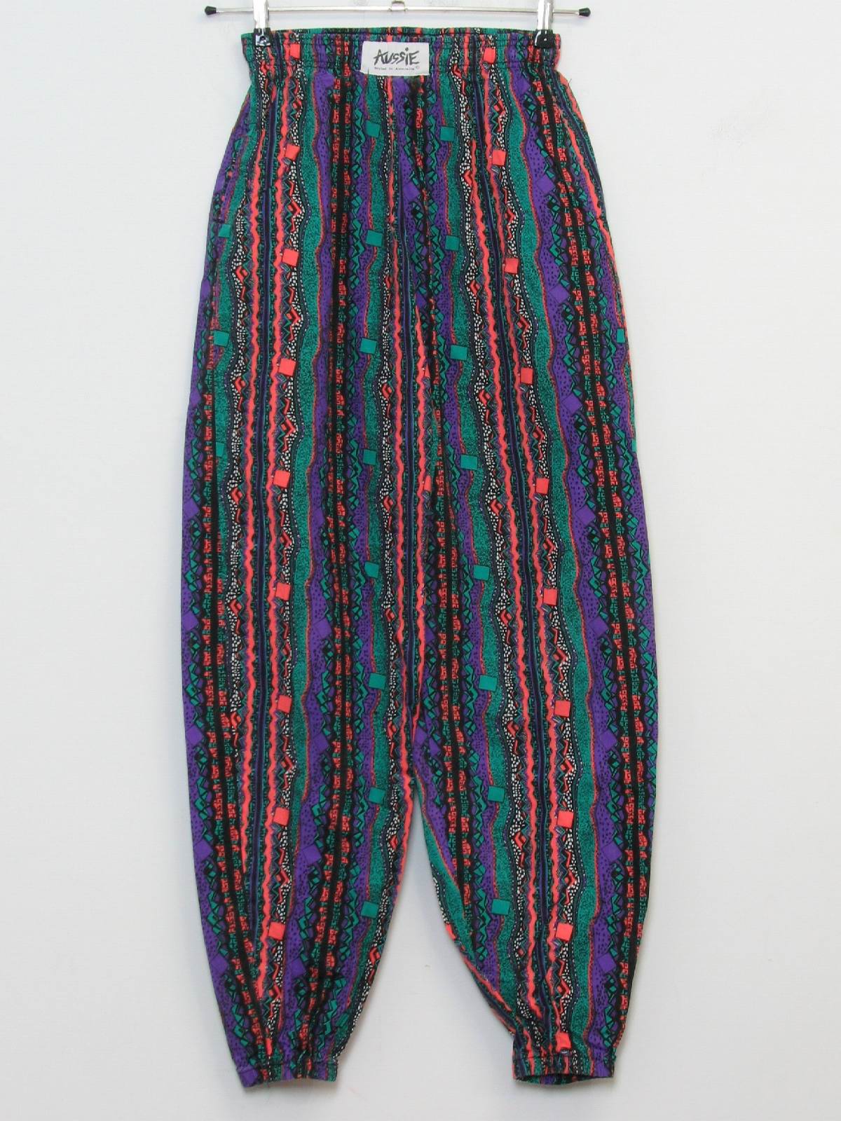 80's Aussie Pants: 80s -Aussie- Mens teal green, black, white, purple and  orange vertical banded geometric print cotton totally 80s baggy pants with  elastic waistline, two inset hip pockets and wide taper