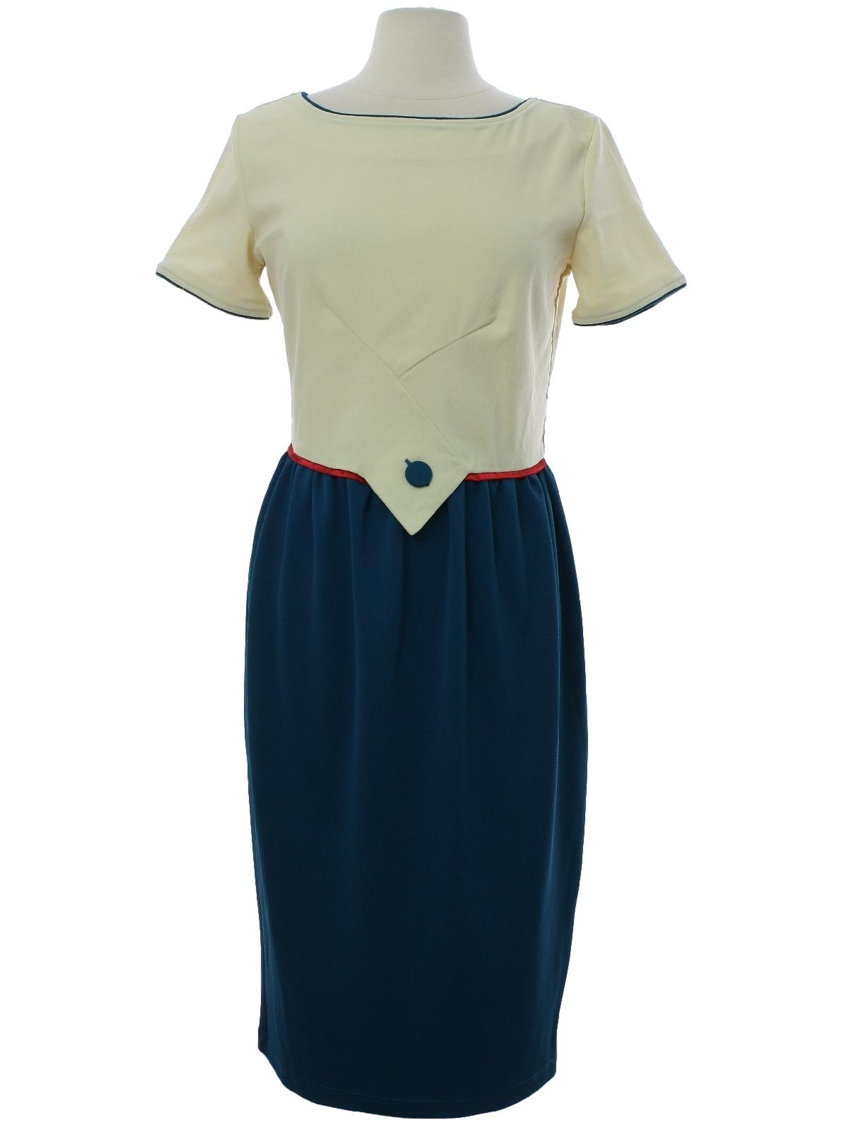 Retro 1980 s Dress Bettie Page by Tatyana 80s Bettie Page by Tatyana Womens teal blue and ivory background polyester and spandex blend short sleeve below knee length dress. Semi scoop fitted waistli...