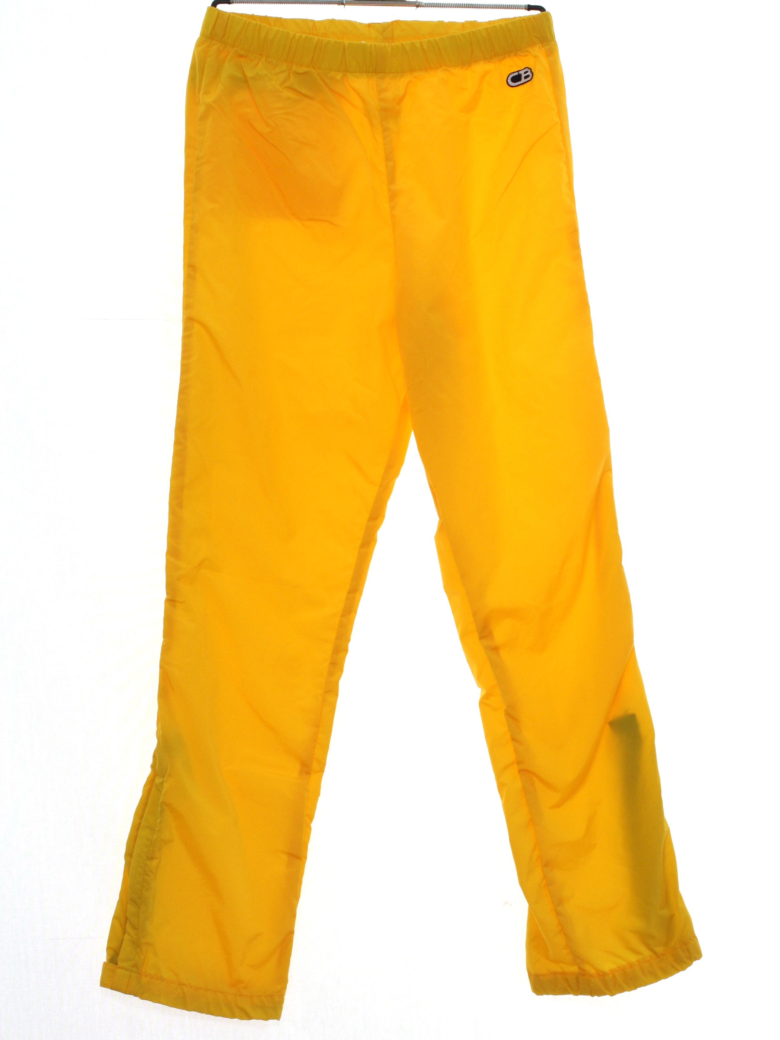 Vintage 1980's Pants: 80s -CB Sports 1985- Mens goldenrod yellow background  nylon shell drawstring elastic waist baggy nylon totally 80s baggy wide leg track  pants with zipper and snap closure at ankles
