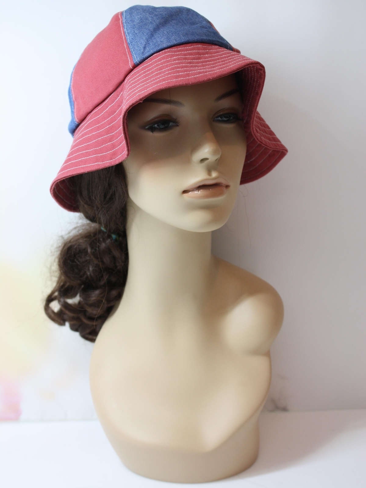 Retro Seventies Hat: 70s -Missing Label- Womens deep rose pink and blue  color block print cotton blend bucket style hat with a 3 inch wide brim and  white top stitching.