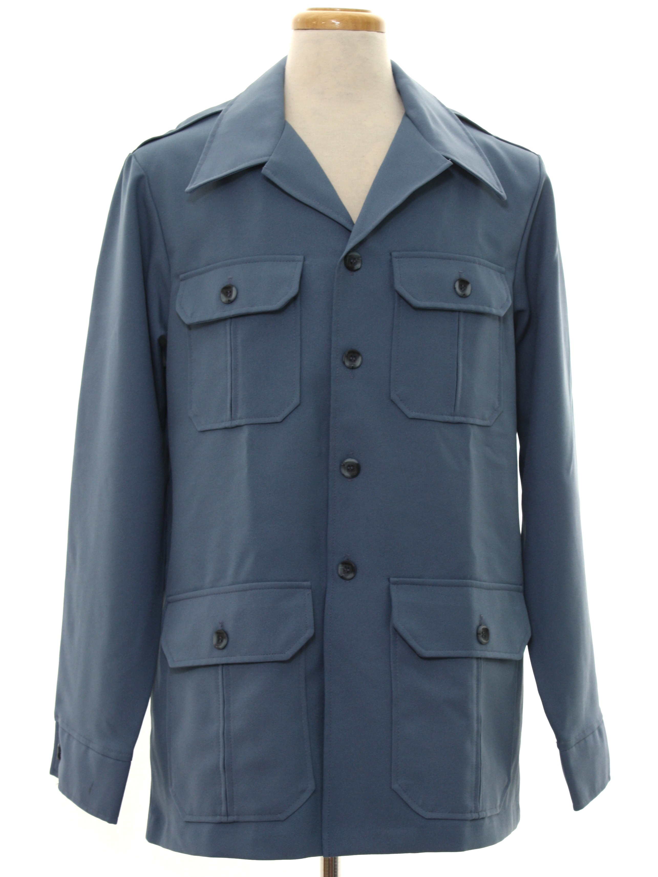Seventies Vintage Jacket 70s Levis Panatela Mens powder blue background polyester button cuff longsleeve button front leisure jacket. Jacket has attached shoulder epaulets. Large fold over collar. F...