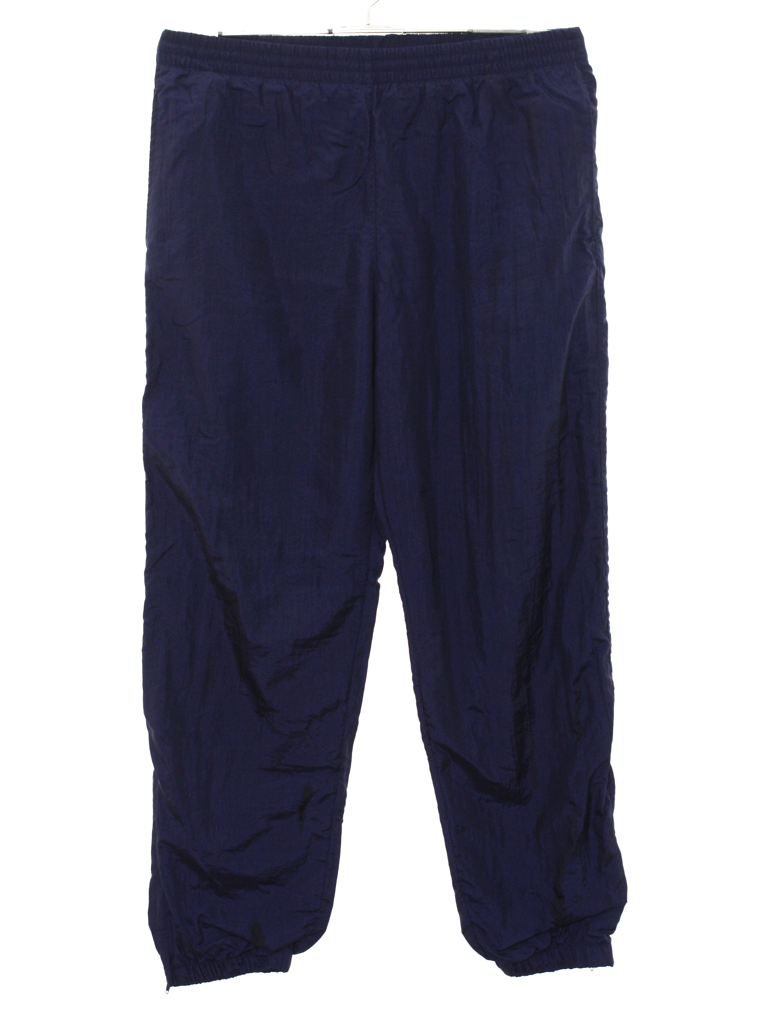 blue track pants with white stripes