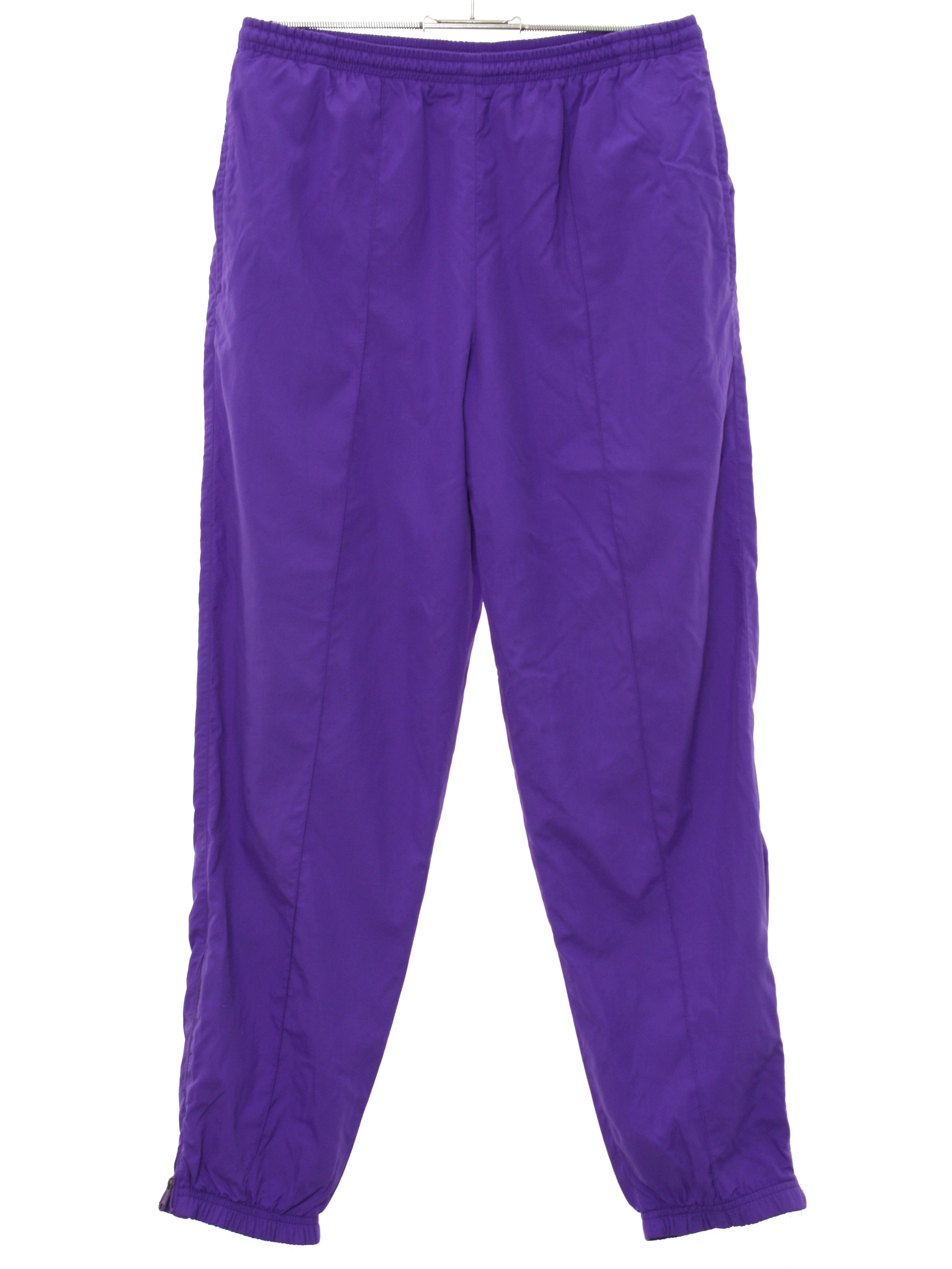 1980s Head Sportswear Pants: 80s -Head Sportswear- Womens purple solid  colored nylon shell , tapered leg baggy totally 80s track pants with  elastic cuff hem with ankle zipper, vertical seam inset side