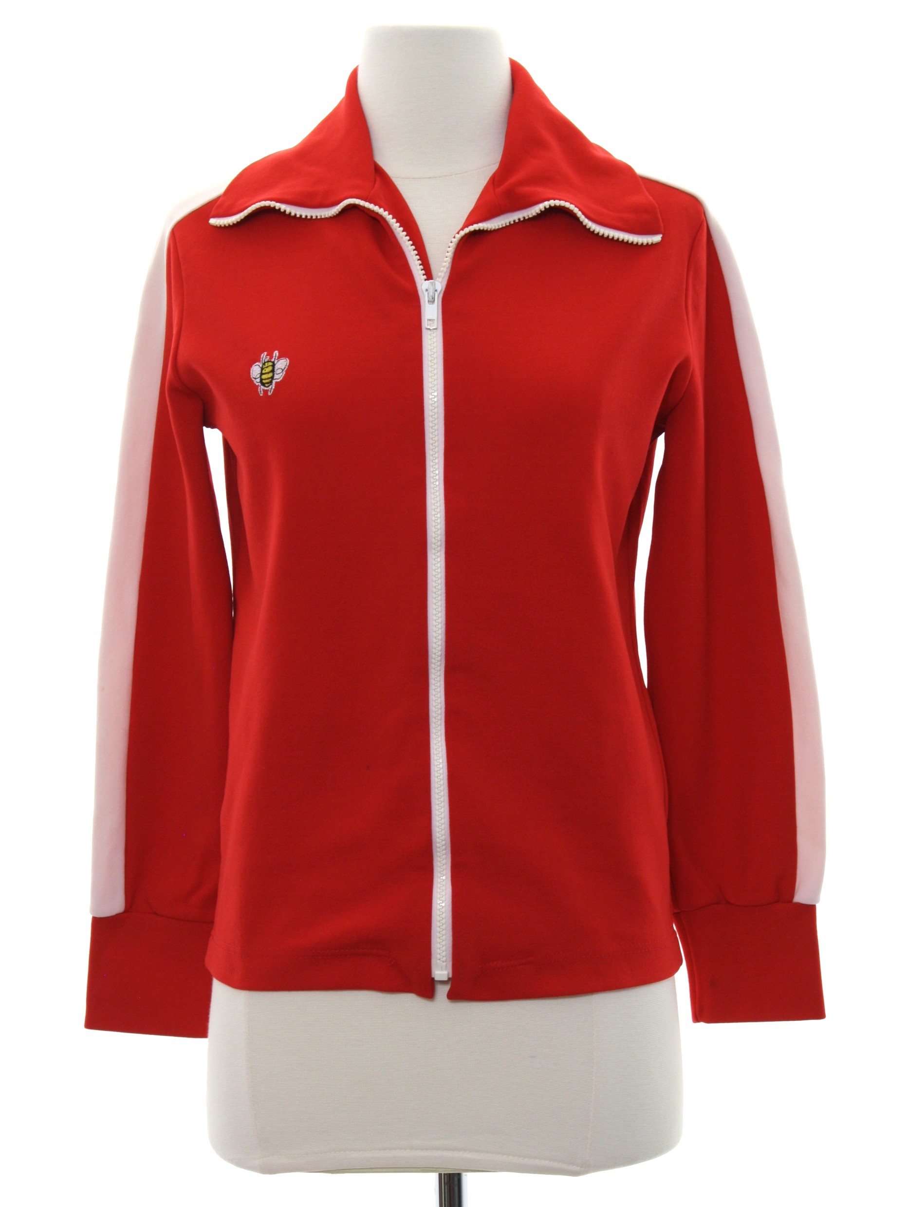 No Label 70\'s Vintage Jacket: 70s -No Label- Womens red and white nylon  longsleeve zip front track or jogging jacket. Stripes down the sleeves, an  embroidered bee design on the right chest