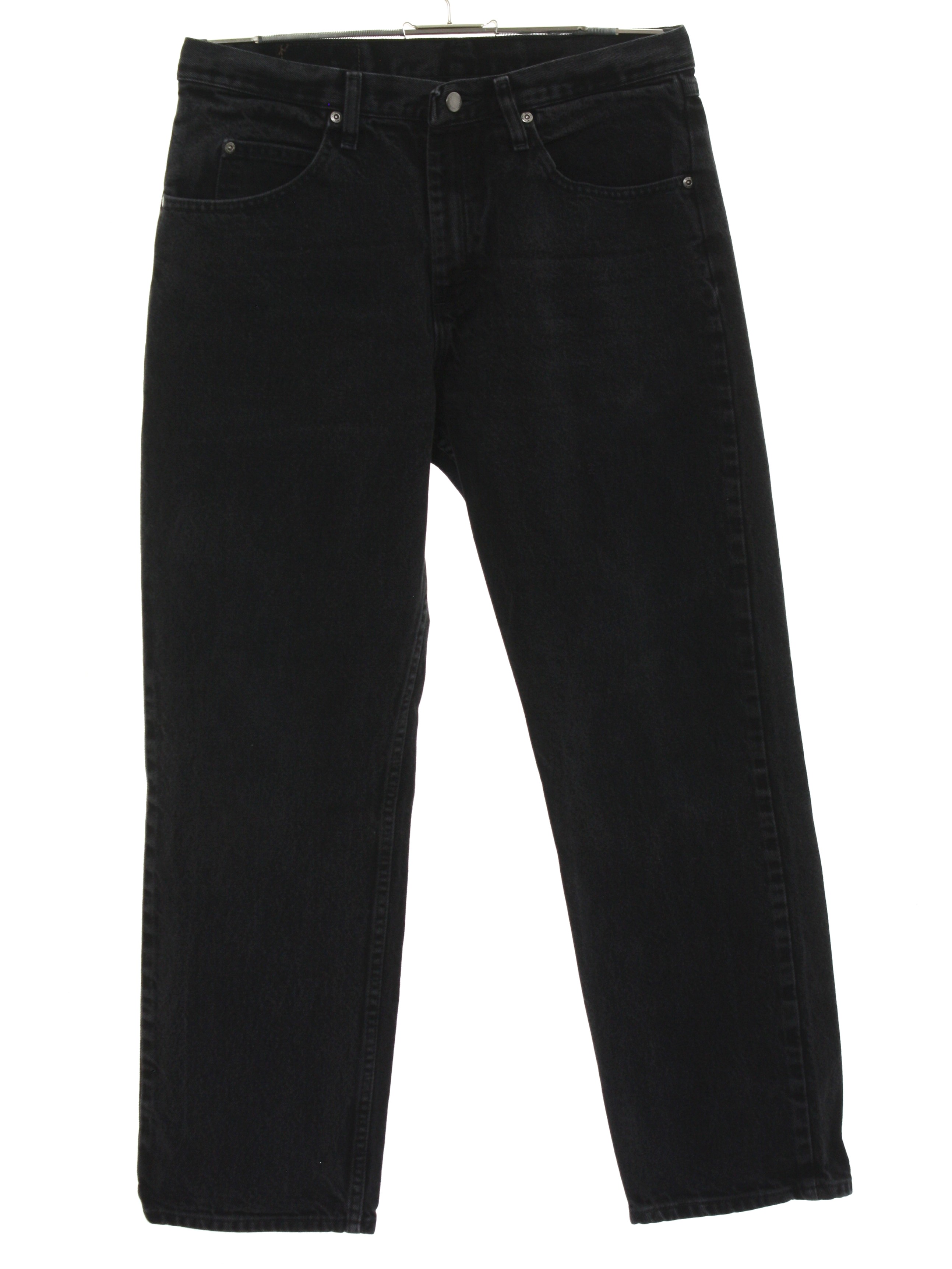 90s Retro Pants: 90s -Wrangler 97601cb- Unisex black slightly faded and  worn cotton denim tapered leg jeans pants with zipper fly closure with  button. Five pocket style - front scoop pockets with