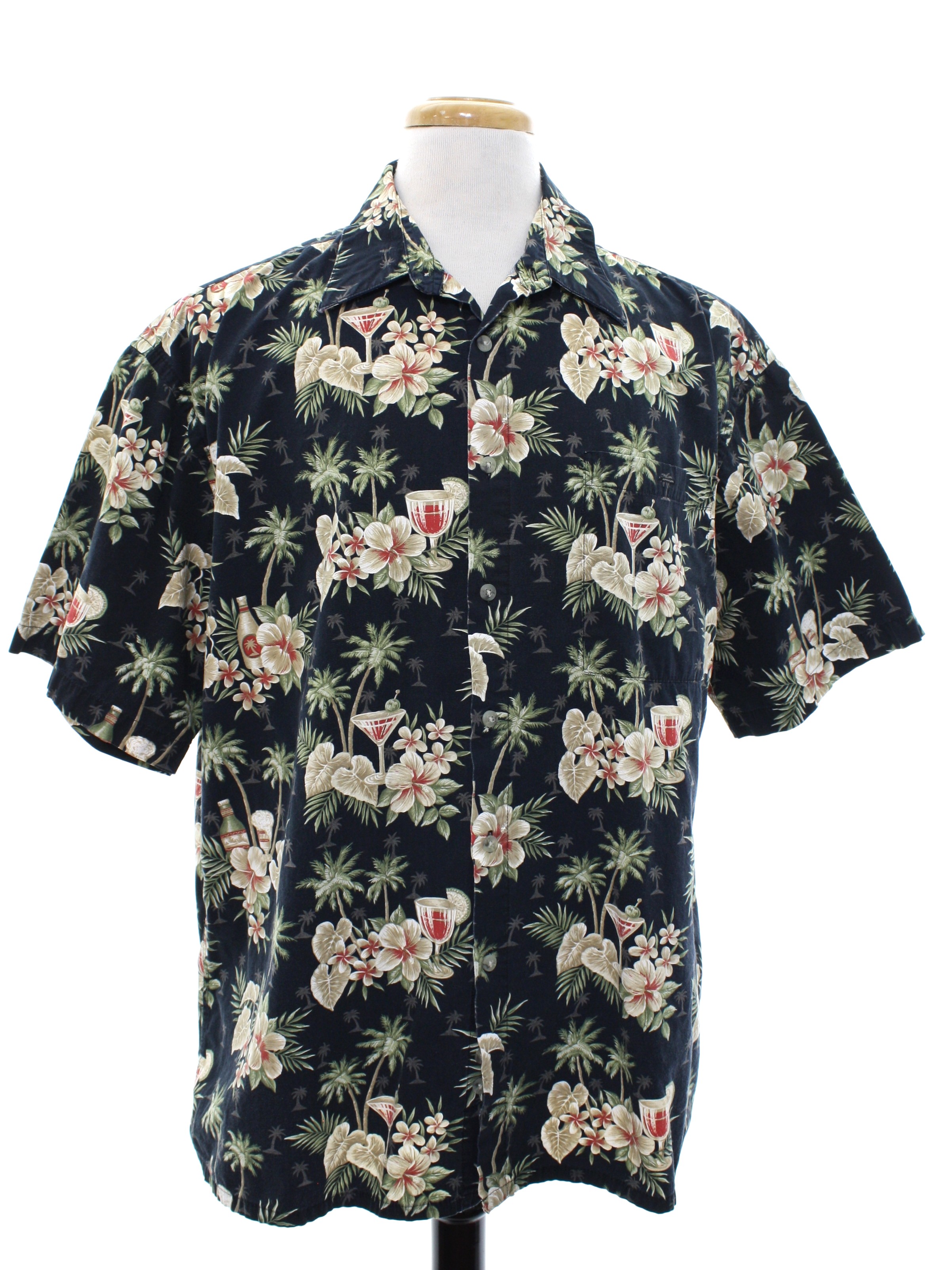 90s Campia Moda Hawaiian Shirt: 90s -Campia Moda- Mens slightly faded black background cotton short sleeve hawaiian shirt booze, flowers, trees and leaves print. Button up front with plastic