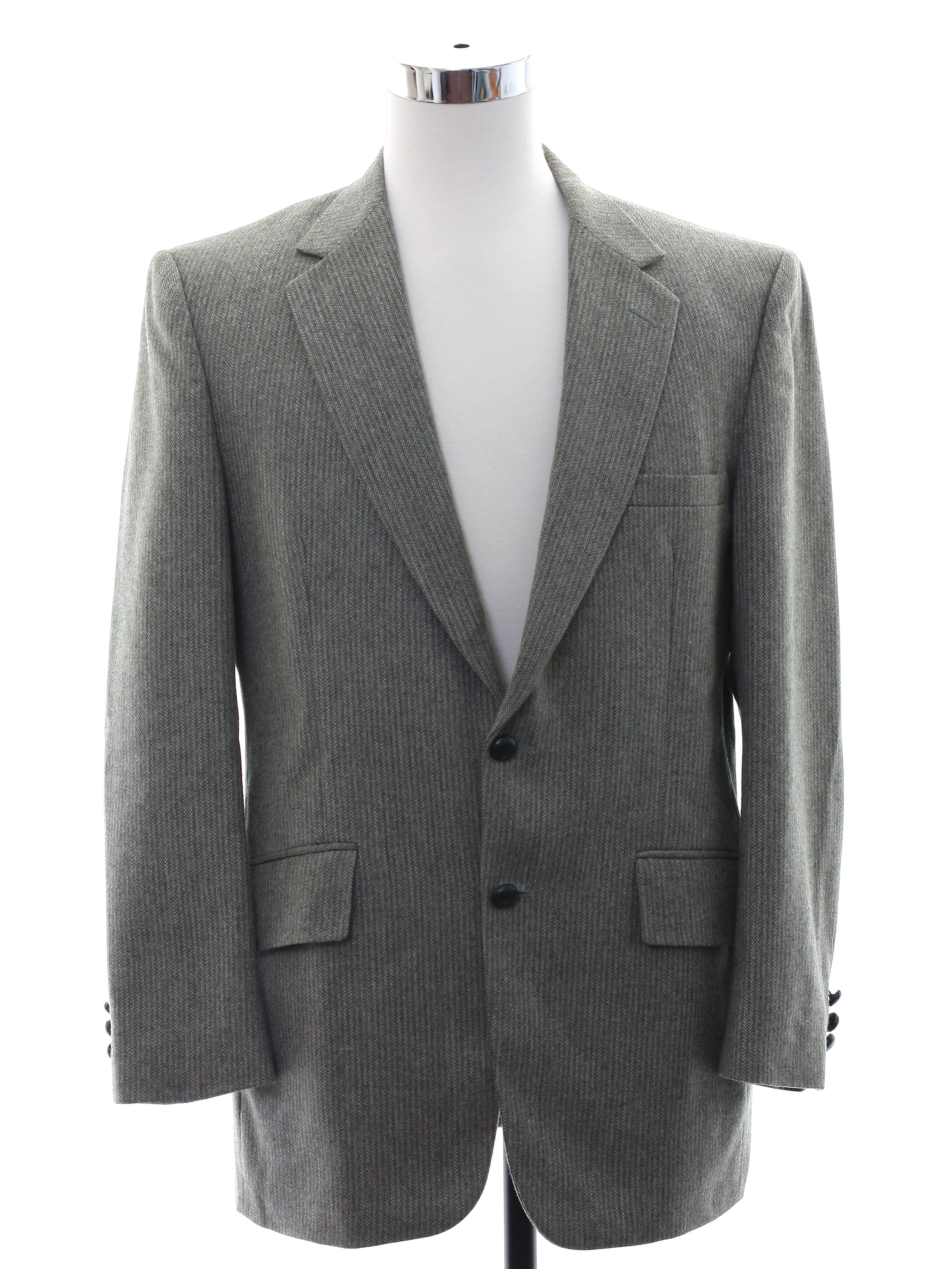 70s Jacket Botany 500 70s Botany 500 Mens grey wool jacket having wide lapels flowing to the two round charcoal faux leather button closing. A trio of smaller matching ones detail each