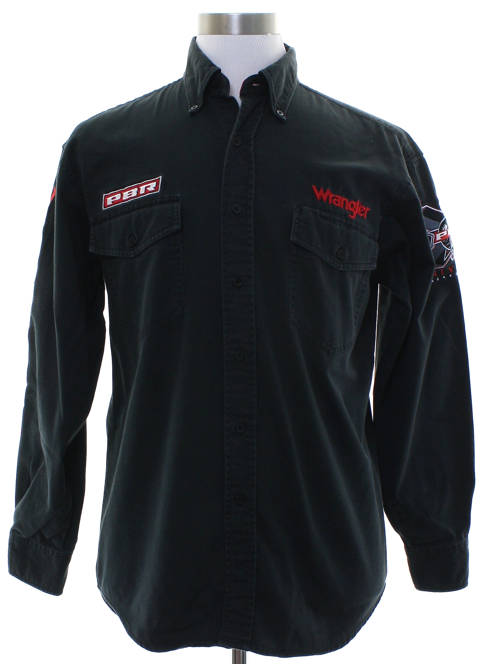 Western Shirt: 90s -Wrangler- Mens faded black background heavy cotton  longsleeve western shirt. (Made in China) button up front. -Wrangler-  embroidered in red above left pocket and on right sleeve, PBR patch