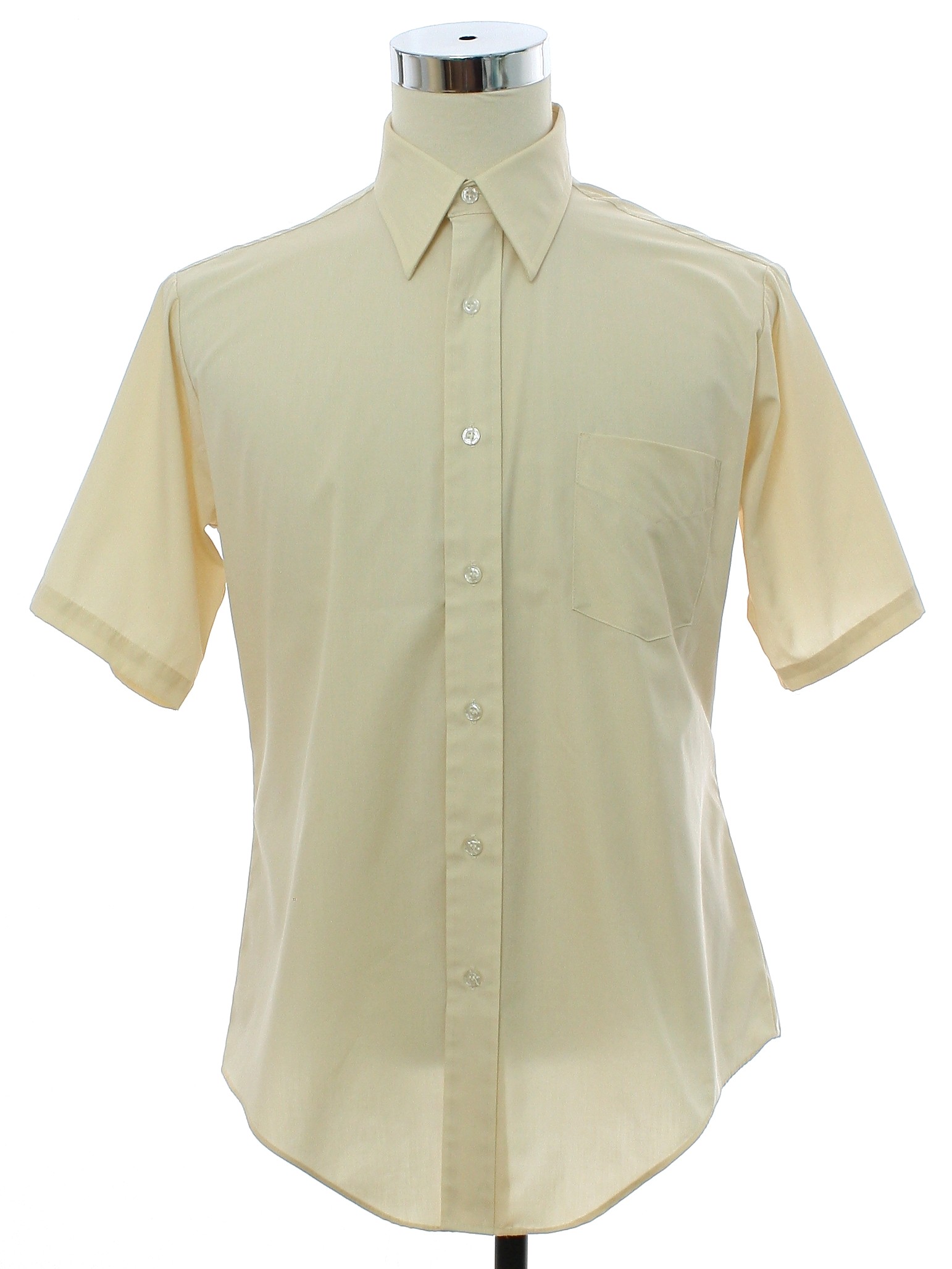 Eighties Van Heusen Shirt 80s Van Heusen Mens ivory cream blended cotton short sleeve shirt having forward shoulder seams extending from the back yoke with a sharp point fold over collar finishing