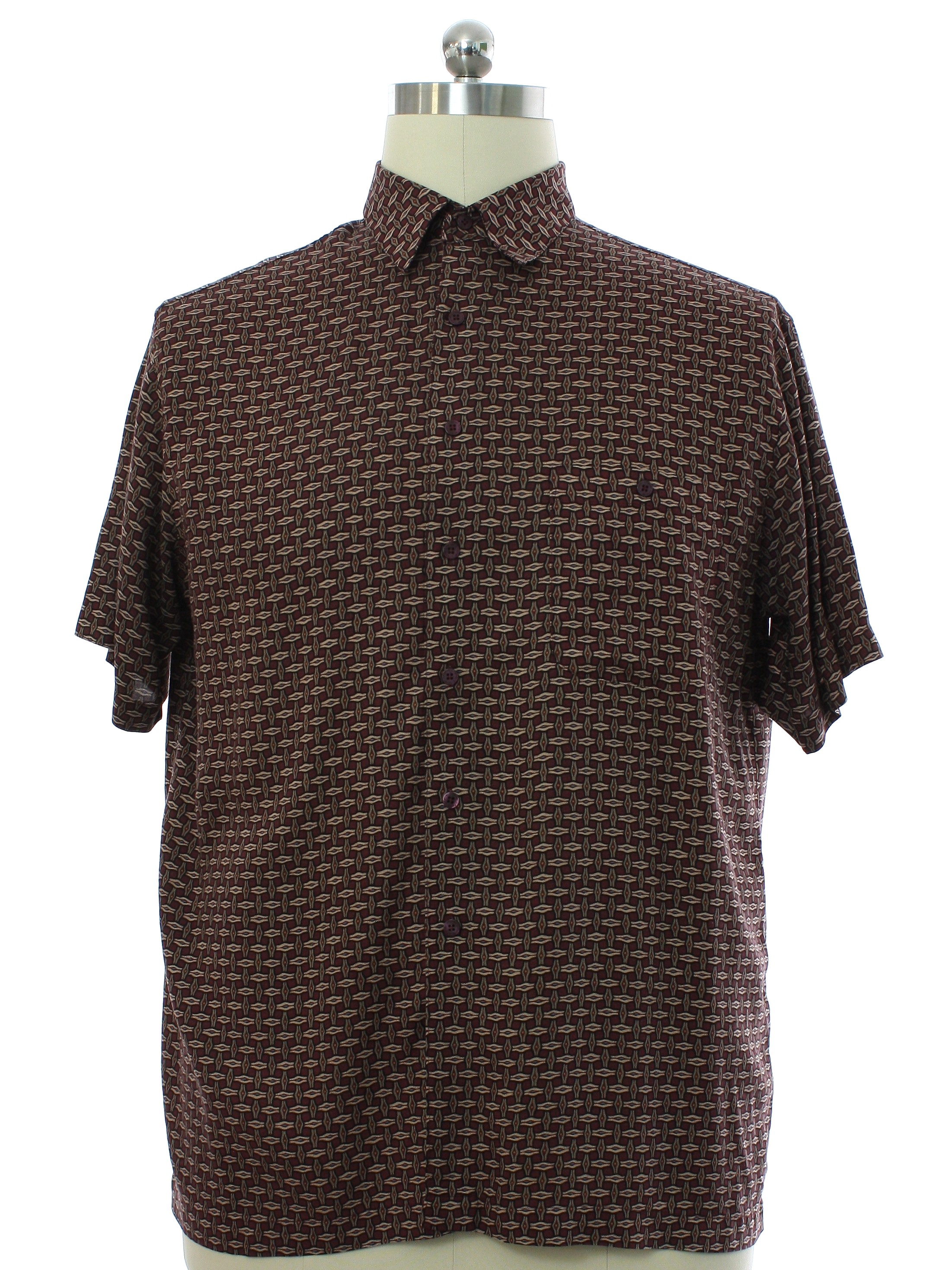 Nineties Vintage Shirt 90s J. Ferrar Mens brown background rayon short sleeve rayon graphic print sport shirt featuring basket weave pattern in shades of brown tan blue and orange. Button up front