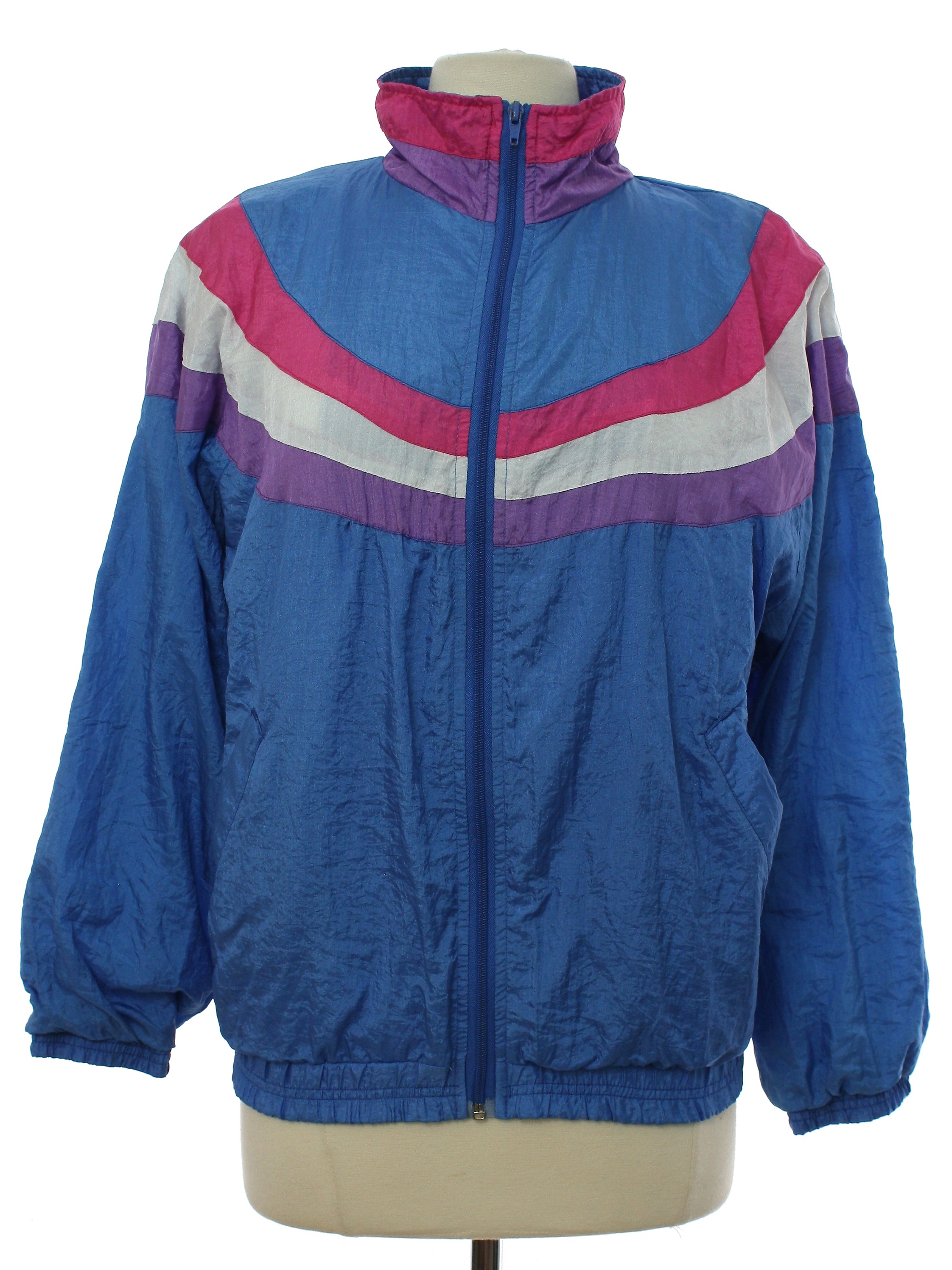 Pro Spirit 80's Vintage Jacket: 80s -Pro Spirit- Womens light blue  background nylon shell banded elastic cuffs dolman longsleeve zip front  windbreaker zip jacket. Rounded stripes in shades of magenta, white, and