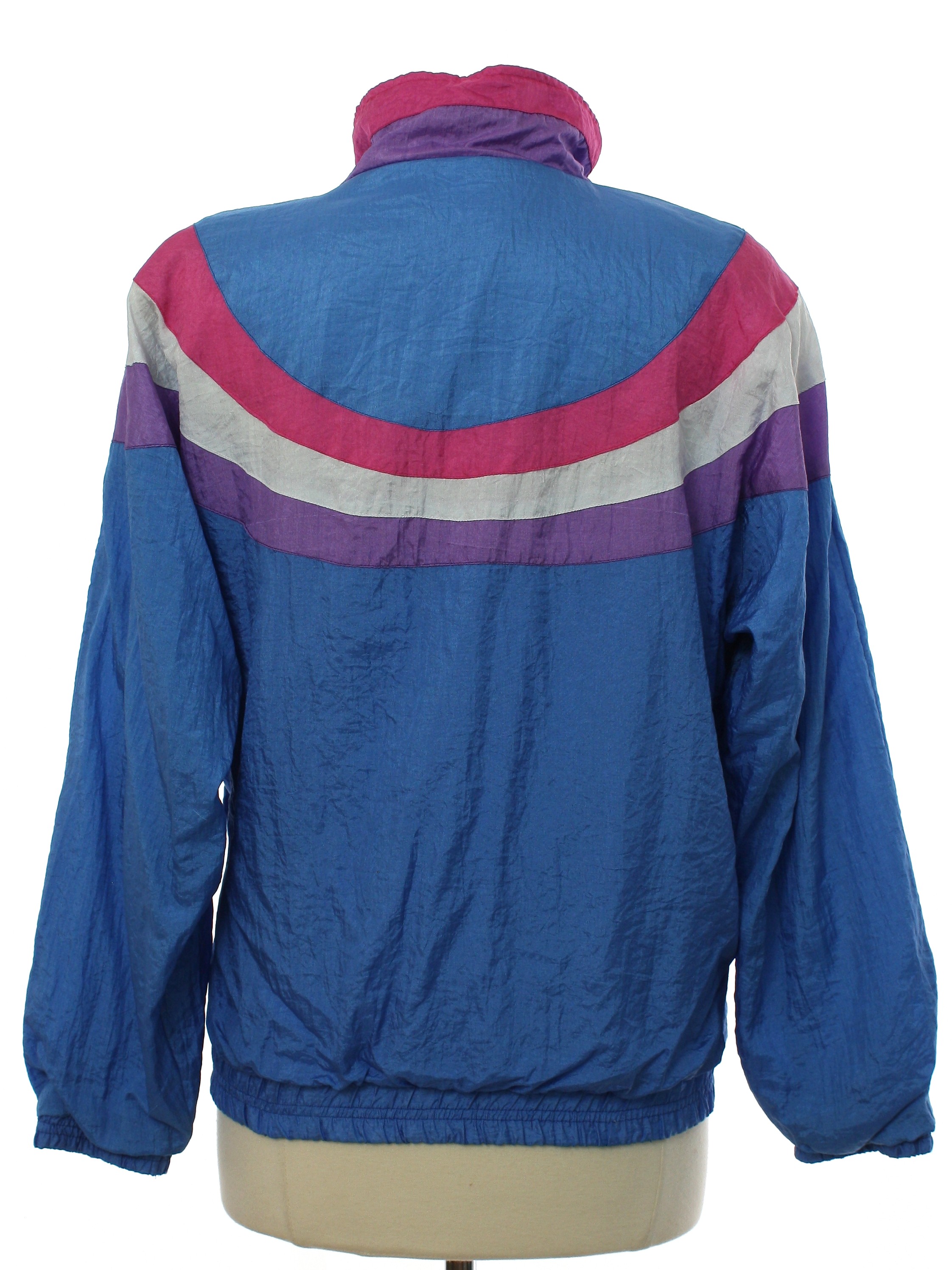 Pro Spirit 80's Vintage Jacket: 80s -Pro Spirit- Womens light blue  background nylon shell banded elastic cuffs dolman longsleeve zip front  windbreaker zip jacket. Rounded stripes in shades of magenta, white, and