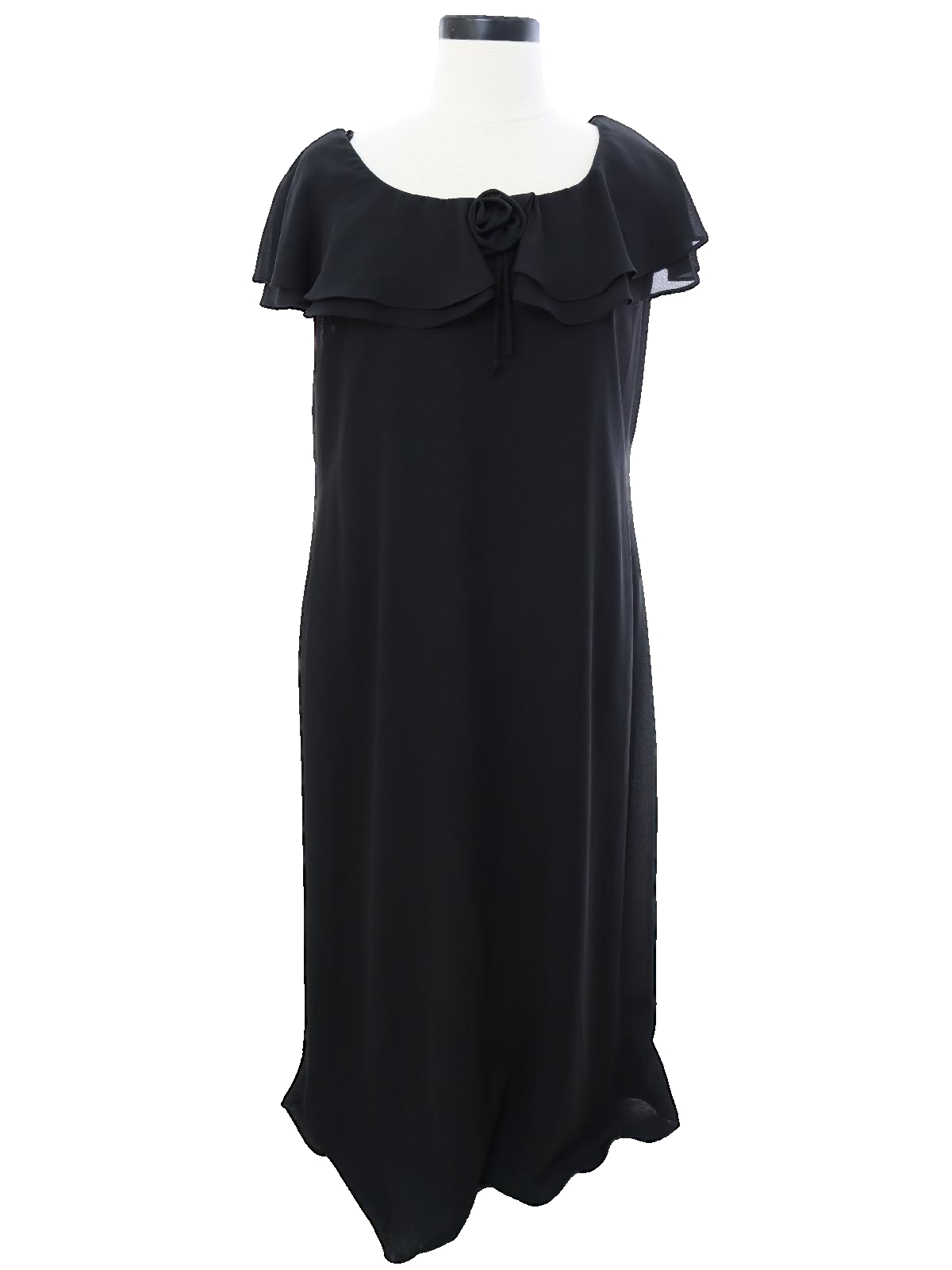 90 s Molly Malloy Cocktail Dress 90s or Newer Molly Malloy Womens black polyester sleeveless dress having dual overlay pieces that extend from the wide round pull over neckline. A single fabric rose...