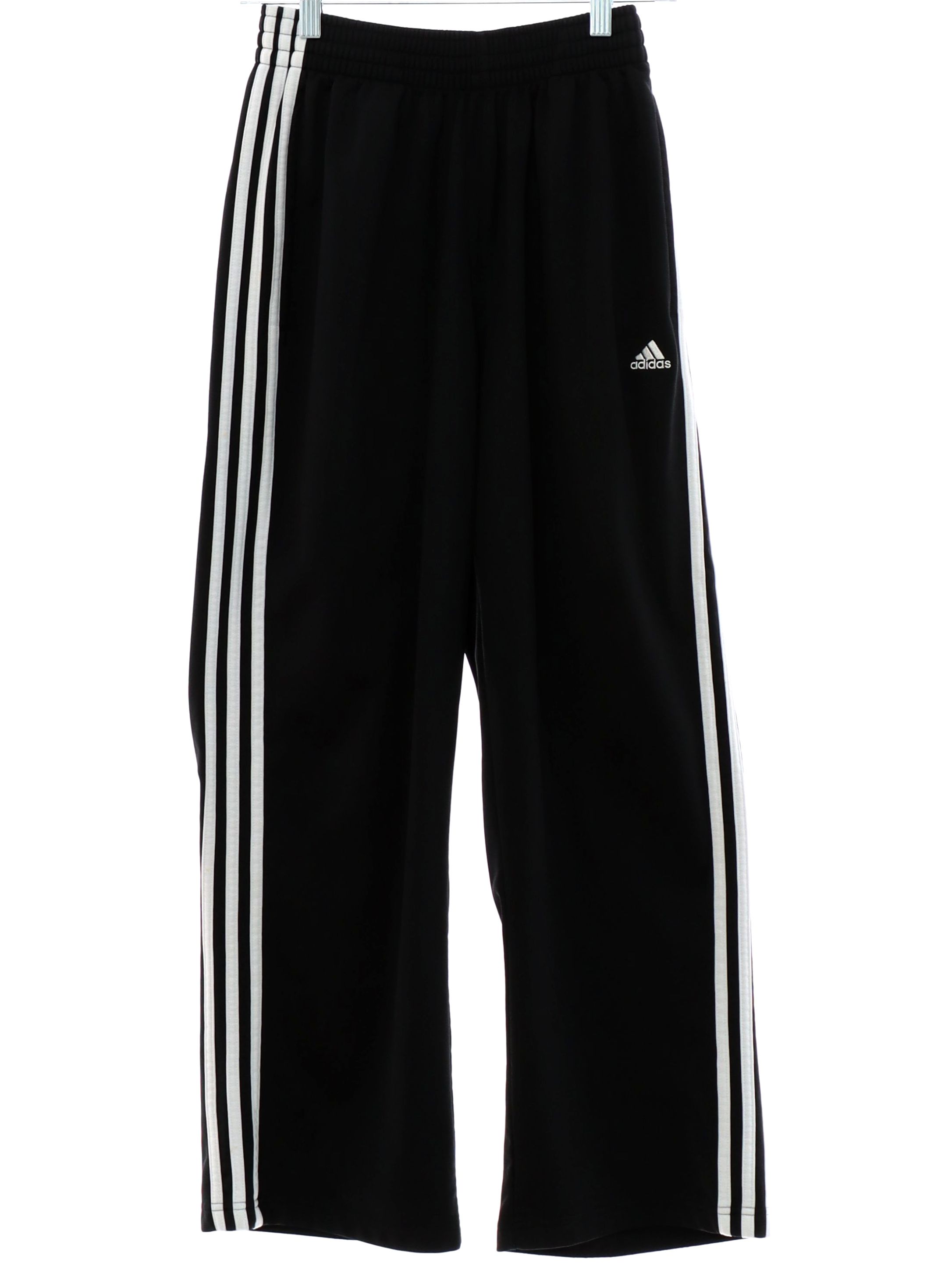 Pants: 90s -Adidas- Unisex black lightweight polyester flat front track pants with cuffless hem, vertical inset side entry front pockets, no rear pockets, elastic waistline with inside drawstring, no belt loops.