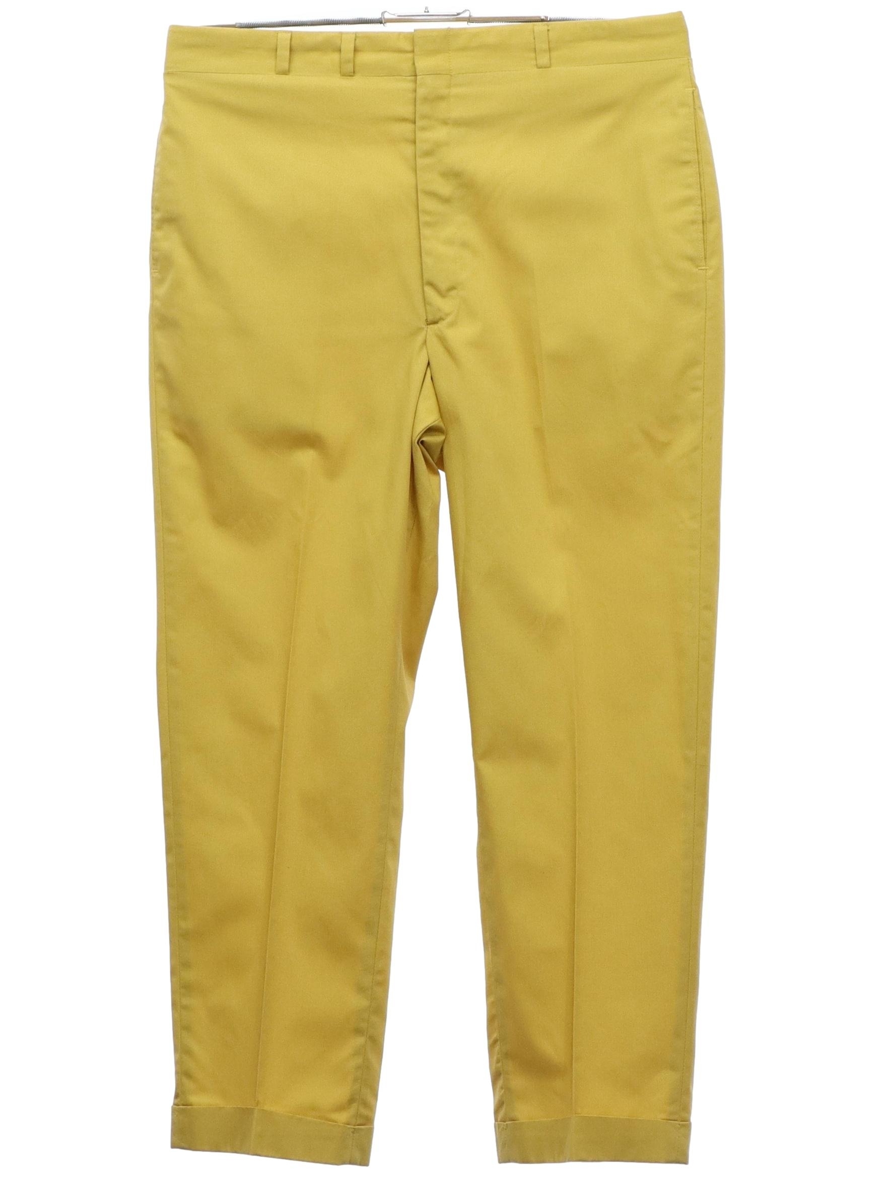 60's Haggar Pants: 60s -Haggar- Mens mustard solid colored polyester cotton  blend flat front slacks pants. Cuffed hem, vertical seam inset side entry  front pockets, one rear inset open pocket and one