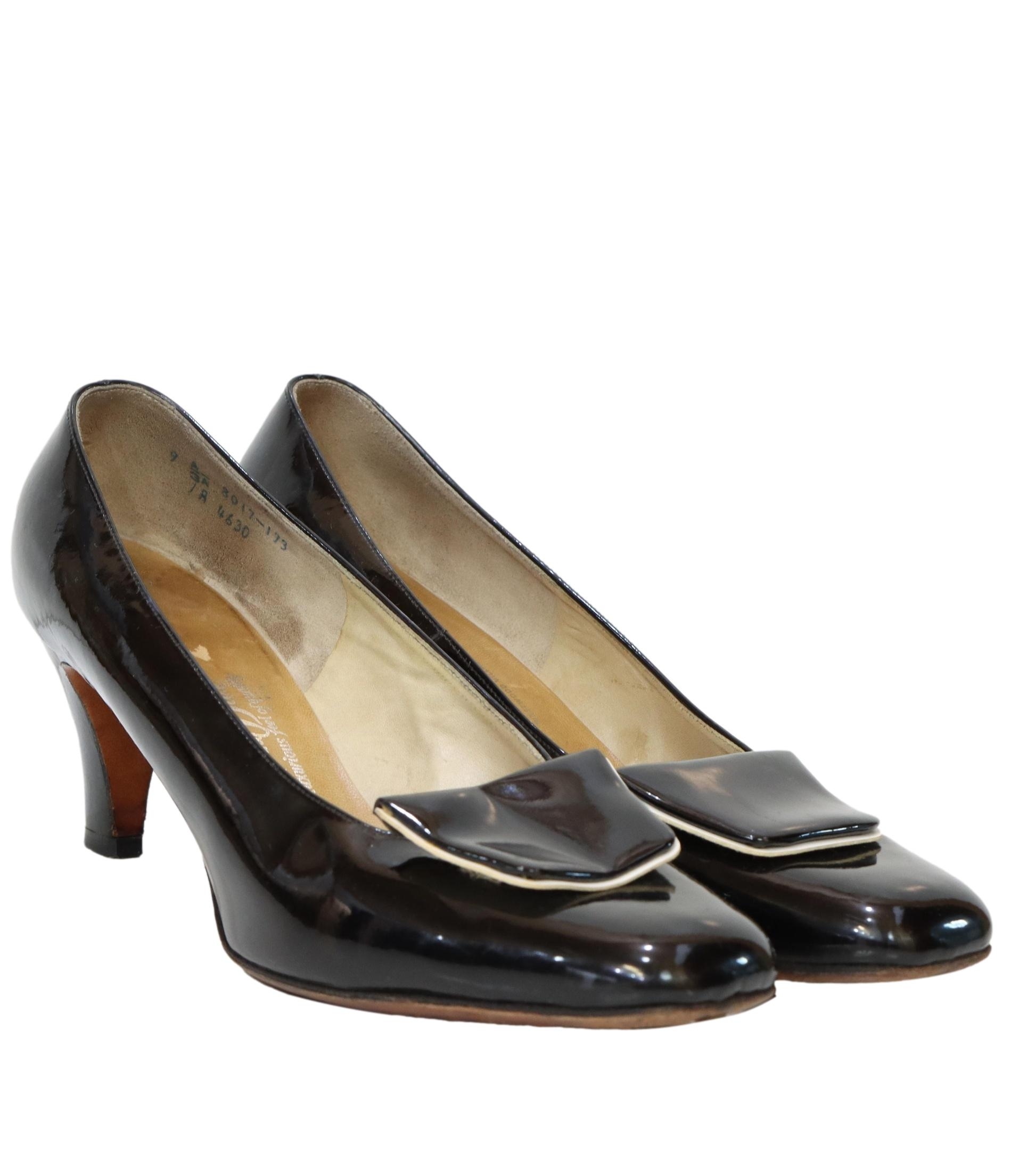 60 s Hill and Dale Shoes 60s Hill and Dale Womens glossy black patent leather pump shoes. Classic style with 3 inch heels metal trim on the soles at the slightly squarish toes
