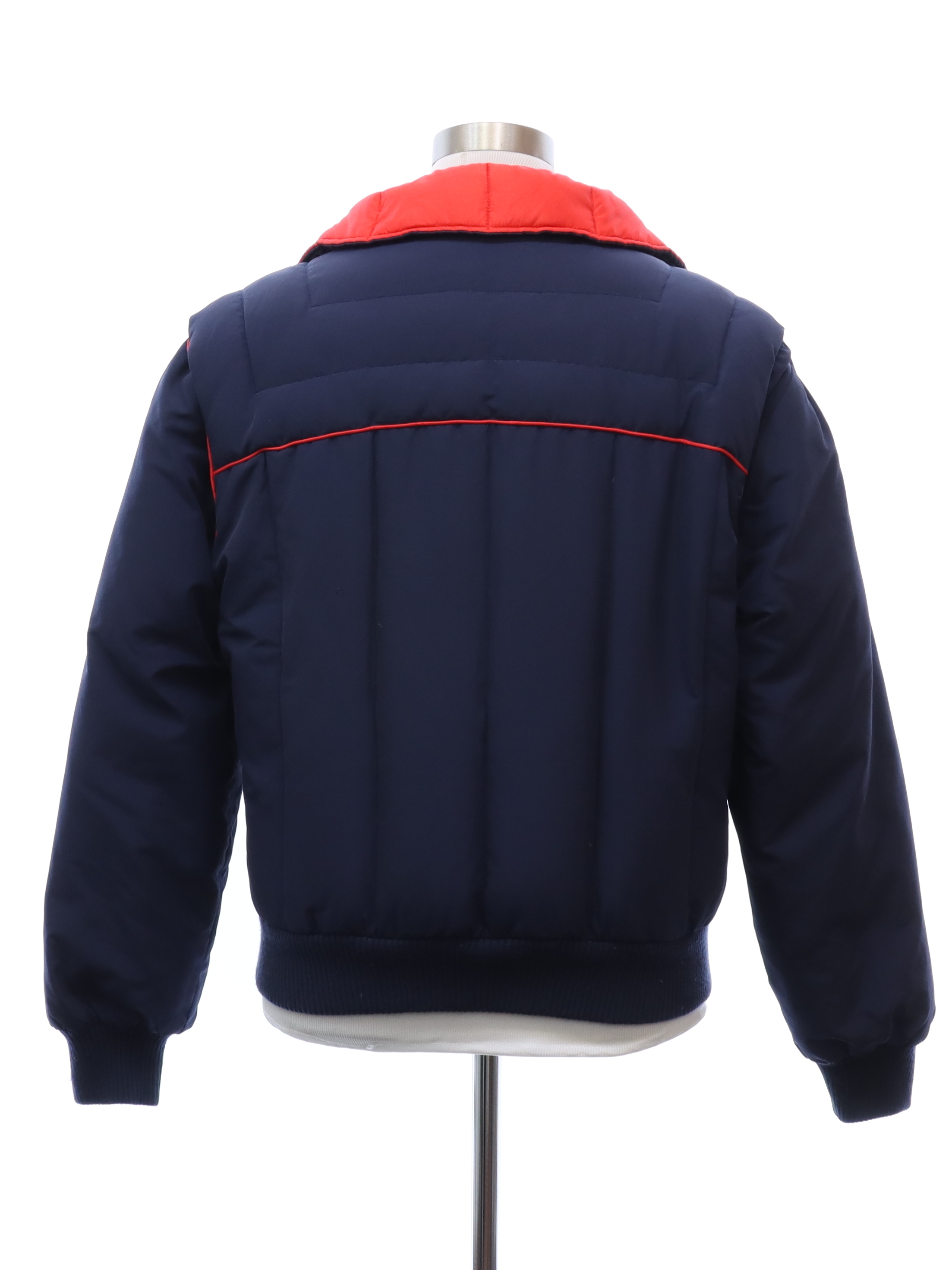 Vintage Powder Down Eighties Jacket 80s Powder Down Mens navy blue nylon blend longsleeve zip front ski jacket with heavy down and feather filling. Red nylon lining and piping trim gussets on the ba...