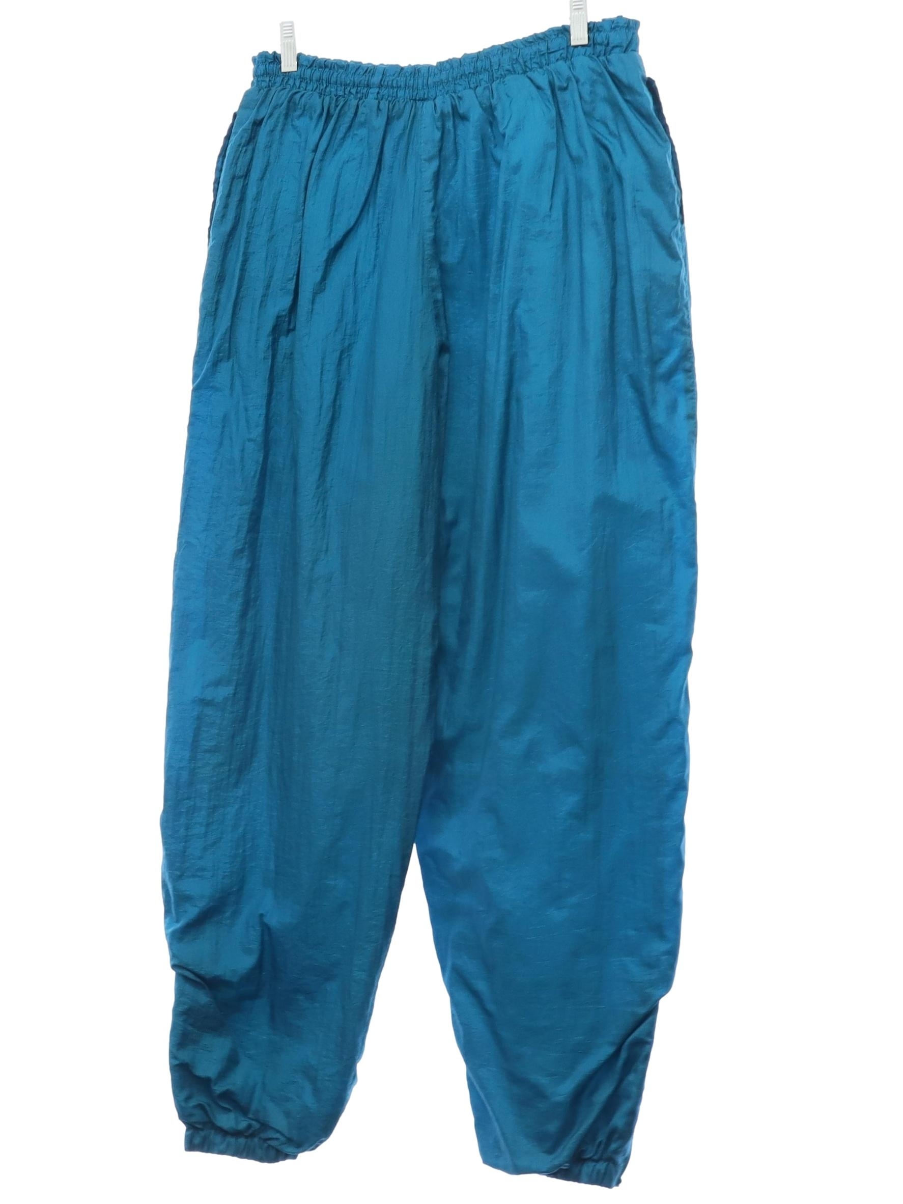 Retro 80s Pants Basic Editions 80s style made in 90s Basic Editions Womens teal blue crinkled nylon shell track pants. Elastic pull on waistband with front inside drawstring ties inset side pockets
