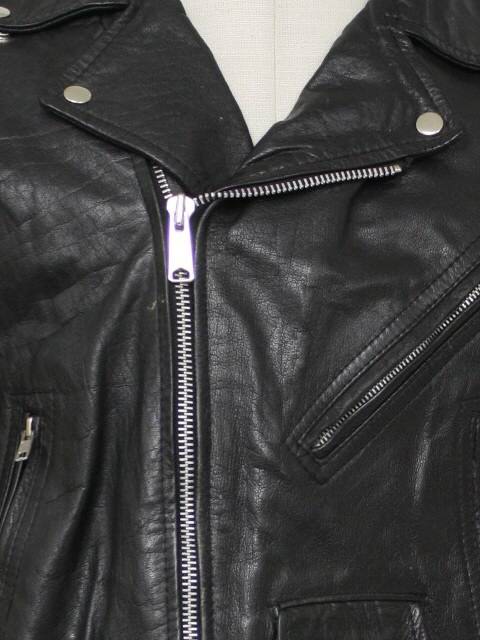 1980s Gino Leathers Leather Jacket 80s Gino Leathers Mens black smooth leather motorcycle jacket with waist length styling waist half belt with buckle front angled zipper zippers on sleeve ends inse...
