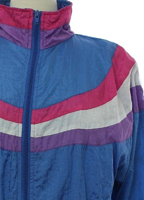 Pro Spirit 80's Vintage Jacket: 80s -Pro Spirit- Womens light blue  background nylon shell banded elastic cuffs dolman longsleeve zip front  windbreaker zip jacket. Rounded stripes in shades of magenta, white, and